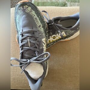 Hoka Speedgoat 6 in Gray & Blue with Orange trim.